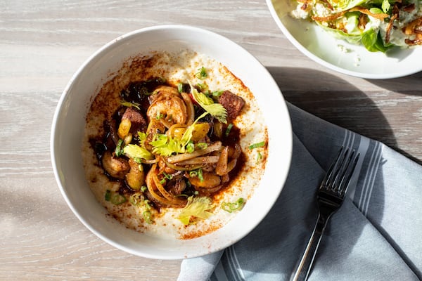 Shrimp and Geechee Boy Grits with house tasso and creole tomato gravy. Photo credit- Mia Yakel.