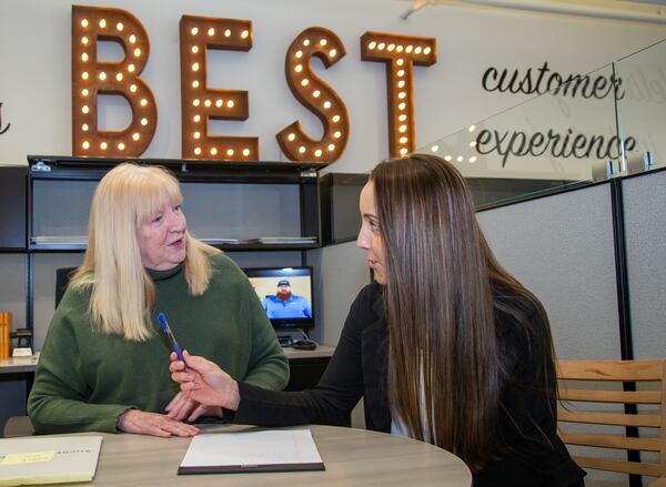 Sandra Waterman (left) & Kaetlyn Porter chat together at the Supreme Lending Southeast Region offices in Alpharetta. Waterman has been with Supreme for 36 years while Porter has worked there since December. For the AJC Top Workplace midsize story. PHIL SKINNER FOR THE ATLANTA JOURNAL-CONSTITUTION.