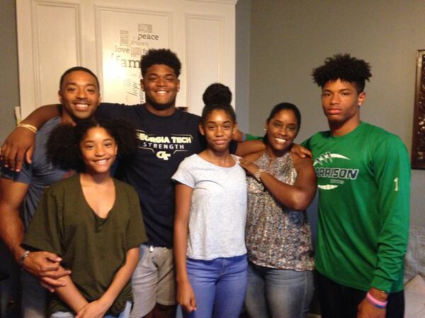  Cortez Alston's family, from left: Marquis Sr., Destinee, Cortez, Eternitee, Aisha, Marquis Jr. (Not pictured: Trinitee) AJC photo by Ken Sugiura