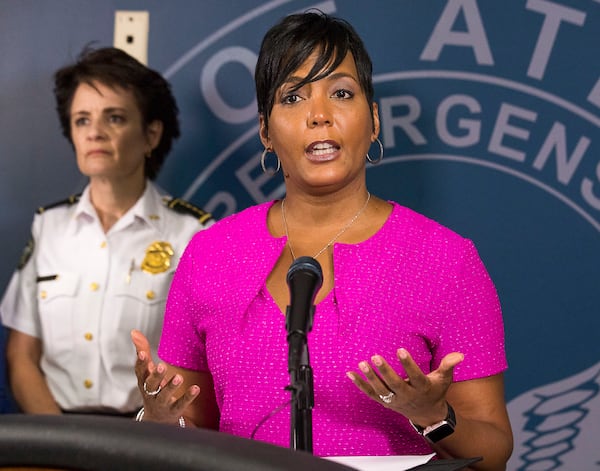 10/07/2019 — Atlanta, Georgia — Atlanta Police Chief Erika Shields (left) listens as Atlanta Mayor Keisha Lance Bottoms speaks during a presser at the Atlanta Public Safety Headquarters, Monday, October 7, 2019. (Alyssa Pointer/Atlanta Journal Constitution)