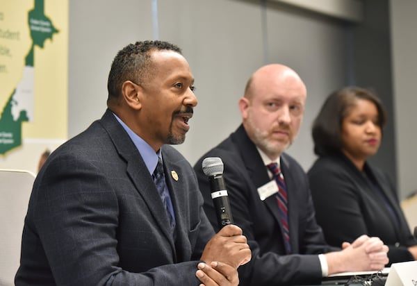 Fulton County Schools officials (from left) Shannon Flounnory (executive director of safety and security), Clifford Jones (chief academic officer) and Gyimah Whitaker (area superintendent of South Learning Community) speak to reporters during a press conference Thursday, Feb. 21, about the Sandtown Middle School incident last week when 28 students were sent to local hospitals after eating Valentine’s Day treats. HYOSUB SHIN / HSHIN@AJC.COM