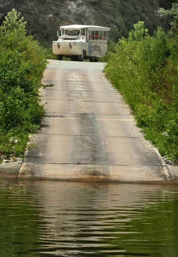 Duck boats operate at Stone Mountain Park. After deadly accidents in other states, the Ride the Duck excursions were temporarily suspended so the vehicles could undergo reviews, then the excursions resumed. Herschend Family Entertainment makes and operates the land-water vehicles at the park. File photo