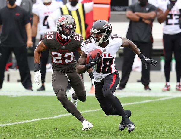 Atlanta Falcons wide receiver Calvin Ridley (18) eludes Tampa Bay Buccaneers cornerback Sean Murphy-Bunting (23) during the first half Sunday, Jan. 3, 2021, in Tampa, Fla. (Mark LoMoglio/AP)