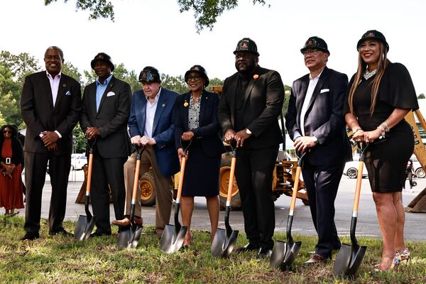 City officials and developers pose for a photo following a press conference announcing the ground breaking for an $800 million mixed-use project in Clayton County on Friday, August 26, 2022.