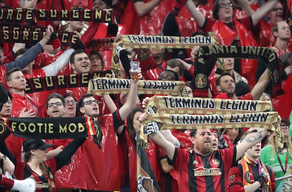 March 11, 2018 Atlanta: A Atlanta United fan toasts the team as they take on the D.C. United during their home opener in a MLS soccer game on Sunday, March 11, 2018, in Atlanta.    Curtis Compton/ccompton@ajc.com