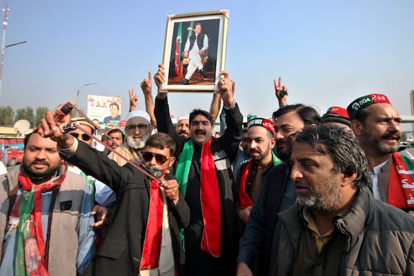 Supporters of imprisoned former premier Imran Khan's Pakistan Tehreek-e-Insaf party, chant slogans before starting a rally for Islamabad to demand Khan's release, in Peshawar, Pakistan, Sunday, Nov. 24, 2024. (AP Photo/Muhammad Sajjad)