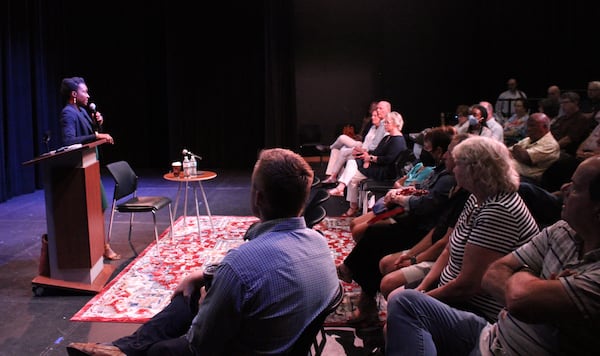 Cobb Chairwoman Lisa Cupid (left) talks with residents about the proposed county budget at a town hall meeting Wednesday, July 20, 2022, in East Cobb. (Taylor Croft/taylor.croft@ajc.com)