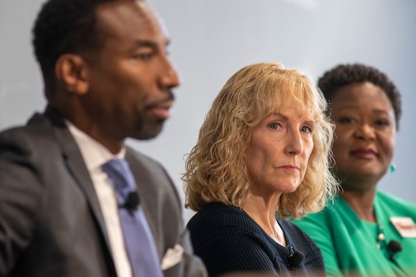 Atlanta mayoral candidates Andre Dickens, left, Sharon Gay, center, and Felicia Moore listen as they are questioned during the second Atlanta mayoral forum at The Works Upper Westside Atlanta in Atlanta’s Underwood Hills community on July 21, 2021. (Alyssa Pointer/Atlanta Journal Constitution)