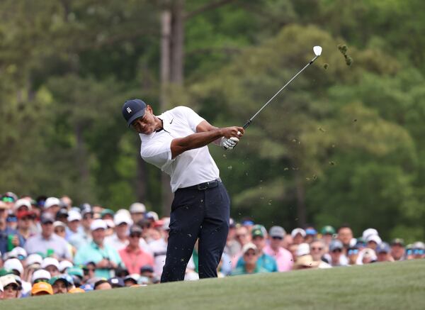 Tiger Woods tees off on 12th hole during first round of the 2023 Masters Tournament at Augusta National Golf Club, Thursday, April 6, 2023, in Augusta, Ga. (Jason Getz / Jason.Getz@ajc.com)
