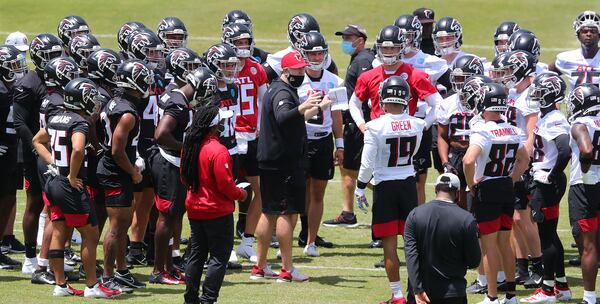 Falcons head coach Arthur Smith (center) addresses the offense and defense for instruction during rookie minicamp on Friday, May 14, 2021, in Flowery Branch. (Curtis Compton / Curtis.Compton@ajc.com)