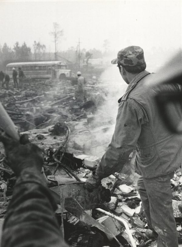 Crews survey the destruction following the chemical explosion on Feb. 3, 1971 at the Thiokol Chemical plant in Woodbine, Georgia.