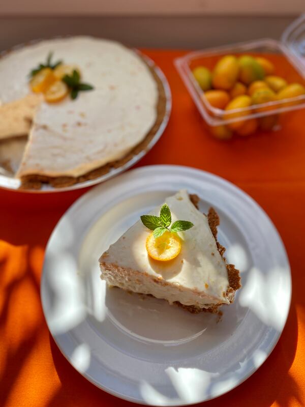 Inspired by a trip to Florida’s kumquat-producing region, this pie is similar to Key lime or a classic lemon icebox pie. (Wendell Brock for The Atlanta Journal-Constitution)