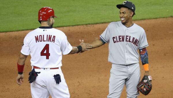 Yadier Molina #4 of the St. Louis Cardinals and the National League reacts with Francisco Lindor #12 of the Cleveland Indians and the American League during the 88th MLB All-Star Game at Marlins Park on July 11, 2017 in Miami, Florida.  (Photo by Rob Carr/Getty Images)