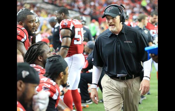 Falcons head coach Dan Quinn tries to fire up his defense after quarterback Matt Ryan was intercepted by the Vikings in the endzone during the third quarter in a football game on Sunday, Nov. 29, 2015, in Atlanta. Curtis Compton