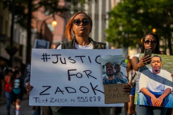 05/25/2021 — Atlanta, Georgia — Attorney Hahnah Williams, sister of Matthew "Zadok" Williams, leads a march outside the Georgia State Capitol Building in May 2021.
 (Alyssa Pointer / Alyssa.Pointer@ajc.com)