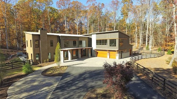 This modern estate at 4056 Hog Mountain Road in Hoschton is listed for $2.195 million. (Photos via zillow.com)