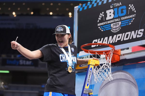 UCLA center Lauren Betts celebrates after an NCAA college basketball game against Southern California in the championship of the Big Ten Conference tournament in Indianapolis, Sunday, March 9, 2025. (AP Photo/Michael Conroy)