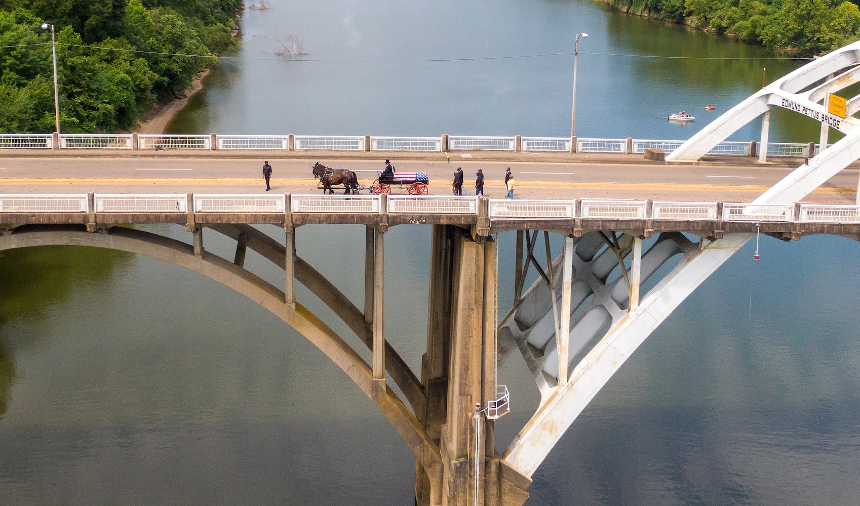 John Lewis crosses Edmund Pettus Bridge for final time