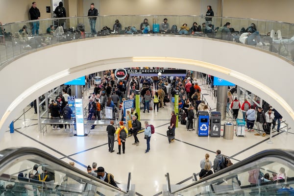 Line wait times in excess of an hour plague travelers at Atlanta Hartsfield-Jackson International Airport. Wednesday, January 22, 2025 (Ben Hendren for the Atlanta Journal-Constitution)