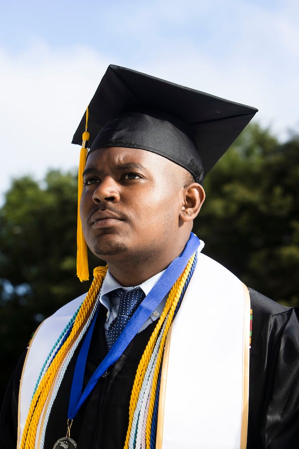 Kareem Michel, an economics major at Morehouse, poses for a portrait before his Morehouse College commencement ceremony Sunday, May 21, 2023, on Century Campus in Atlanta. Michel is part of AltFinance's first cohort to graduate. CHRISTINA MATACOTTA FOR THE ATLANTA JOURNAL-CONSTITUTION