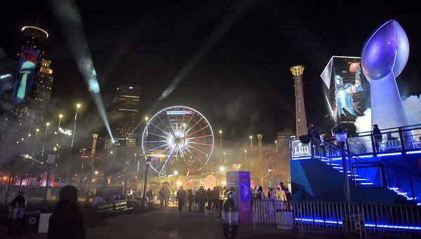 Centennial Olympic Park was full of lights Saturday, the opening night of Super Bowl Live. The fan village will feature concerts and other attractions all week, leading up to the Big Game. Atlanta rapper Pastor Troy and headliner The S.O.S. Band kicked things off. Admission is free to Super Bowl Live, which will be open daily through Feb. 2, except for Tuesday and Wednesday. RYON HORNE / RHORNE@AJC.COM