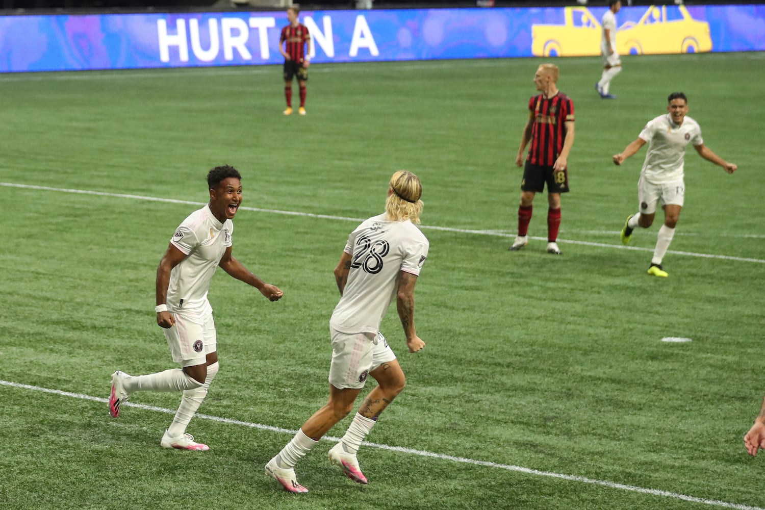 Miami defender Break Shea (28, center) celebrates his goal with forward Juan Agudelo (12) in the fist half against Atlanta United at Mercedes-Benz Stadium Saturday, September 19, 2020 in Atlanta. JASON GETZ FOR THE ATLANTA JOURNAL-CONSTITUTION