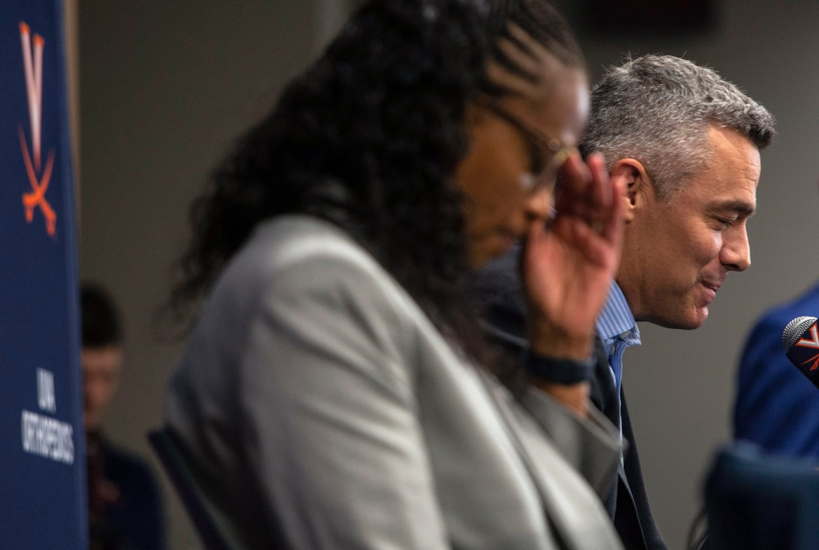 Virginia NCAA college basketball coach Tony Bennett, right, announces his retirement as athletic director Carla Willliams looks on during a press conference in Charlottesville, Va., Friday, Oct. 18, 2024. (Cal Cary/The Daily Progress via AP)