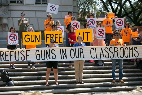 Nationwide, students are protesting campaigns to open college campuses to firearms. (AJC file)