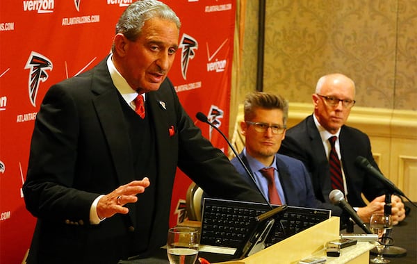 122914 ATLANTA: Falcons owner Arthur Blank (from left), GM Thomas Dimitroff and President Rich McKay take questions during a press conference following the firing of head coach Mike Smith at the Arthur M. Blank Foundation on Monday, Dec. 29, 2014, in Atlanta. Blank is leading the team's search for a replacement. Curtis Compton / ccompton@ajc.com FILE PHOTO: 122914 ATLANTA: Falcons owner Arthur Blank (from left), GM Thomas Dimitroff and President Rich McKay take questions during a press conference following the firing of head coach Mike Smith at the Arthur M. Blank Foundation on Monday, Dec. 29, 2014, in Atlanta. The team now knows how much it will cost to extend Julio Jones' contract. (Curtis Compton / ccompton@ajc.com)