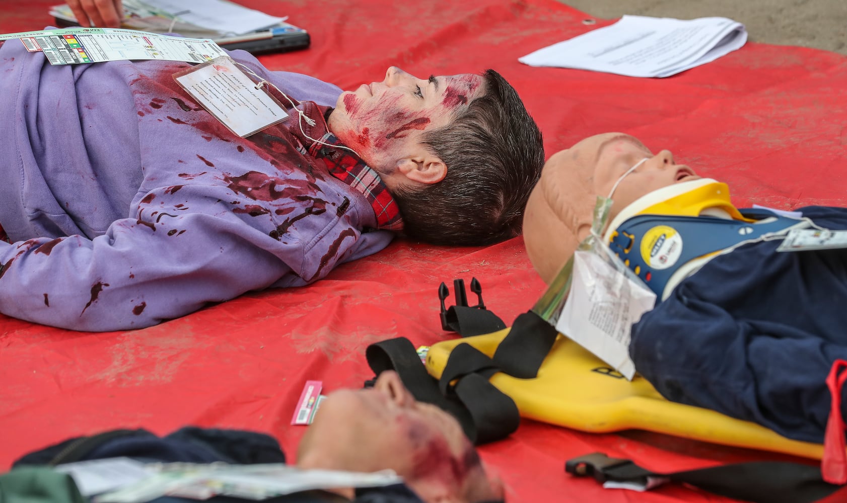 About 50 people volunteered to act as victms  in realistic disaster scenarios and scenes during the emergency preparedness training session Thursday, Oct. 19, 2023. (John Spink / John.Spink@ajc.com) 

