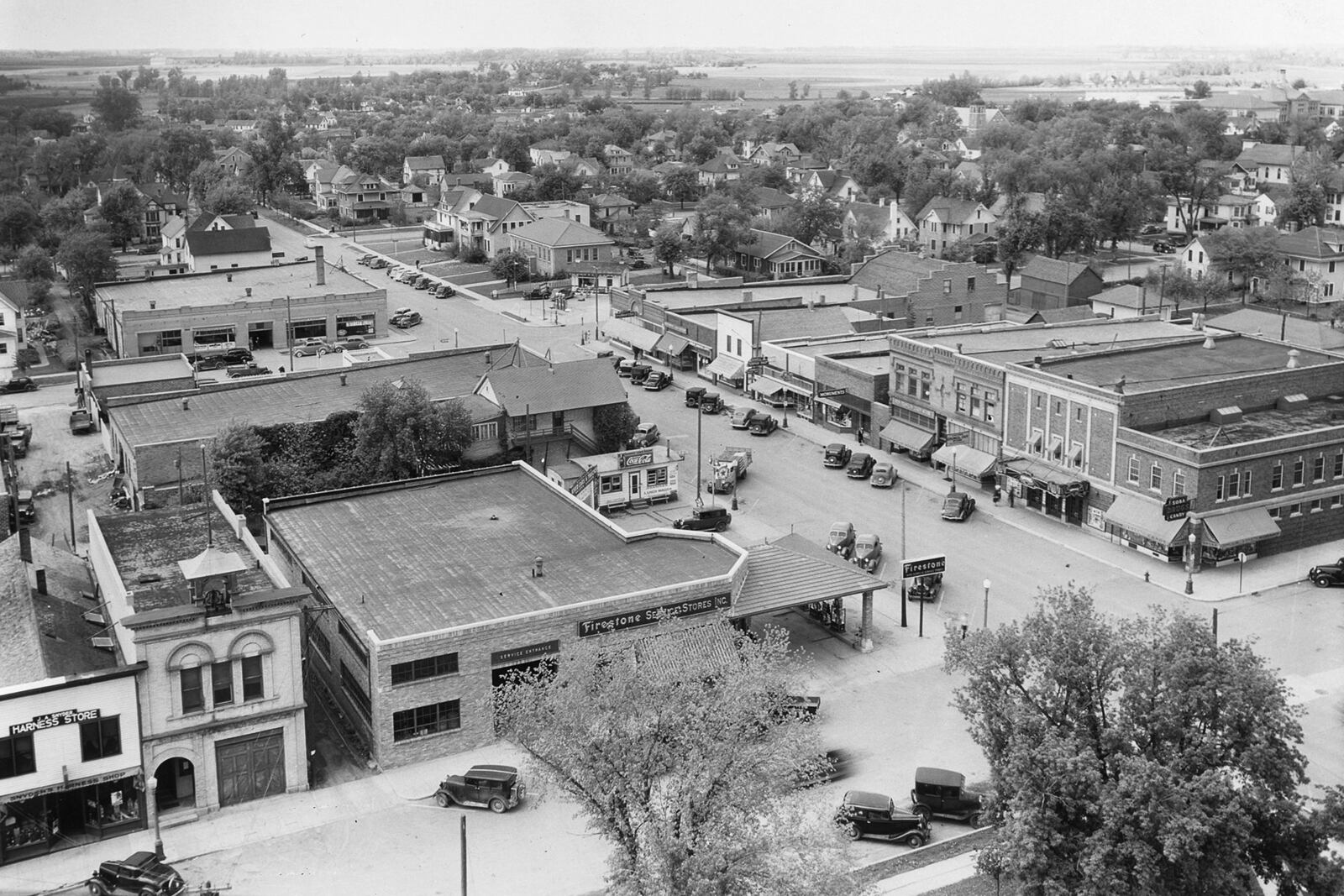 This 1940s photo provided by The Globe, Worthington, shows local businesses in downtown Worthington, Minn. (The Globe, Worthington via AP)