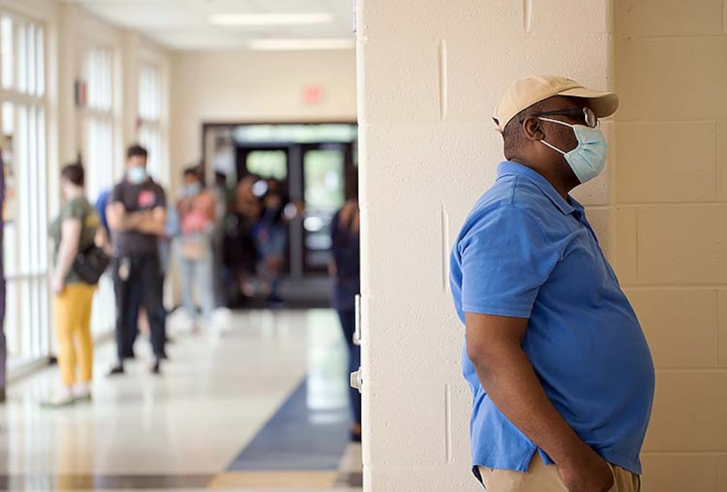 PHOTOS: Georgia voters struggle with long lines, new equipment, social distancing