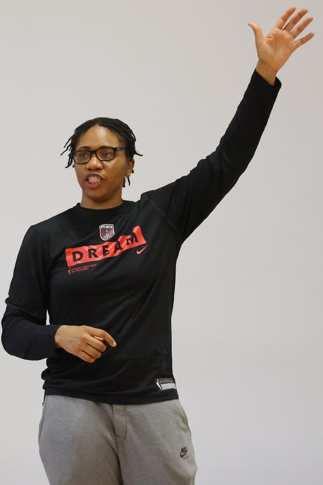 Atlanta Dream head coach Tanisha Wright gives directions from the back of the court during a practice session on Monday, April 18, 2022. Miguel Martinez/miguel.martinezjimenez@ajc.com