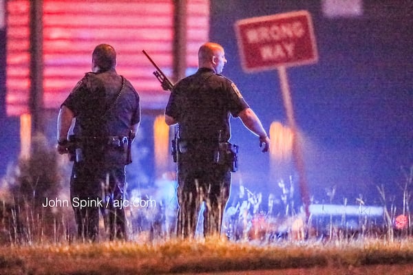 Authorities searched for a tiger after getting several calls about a big cat on the I-75 North ramp to Jodeco Road. JOHN SPINK / JSPINK@AJC.COM