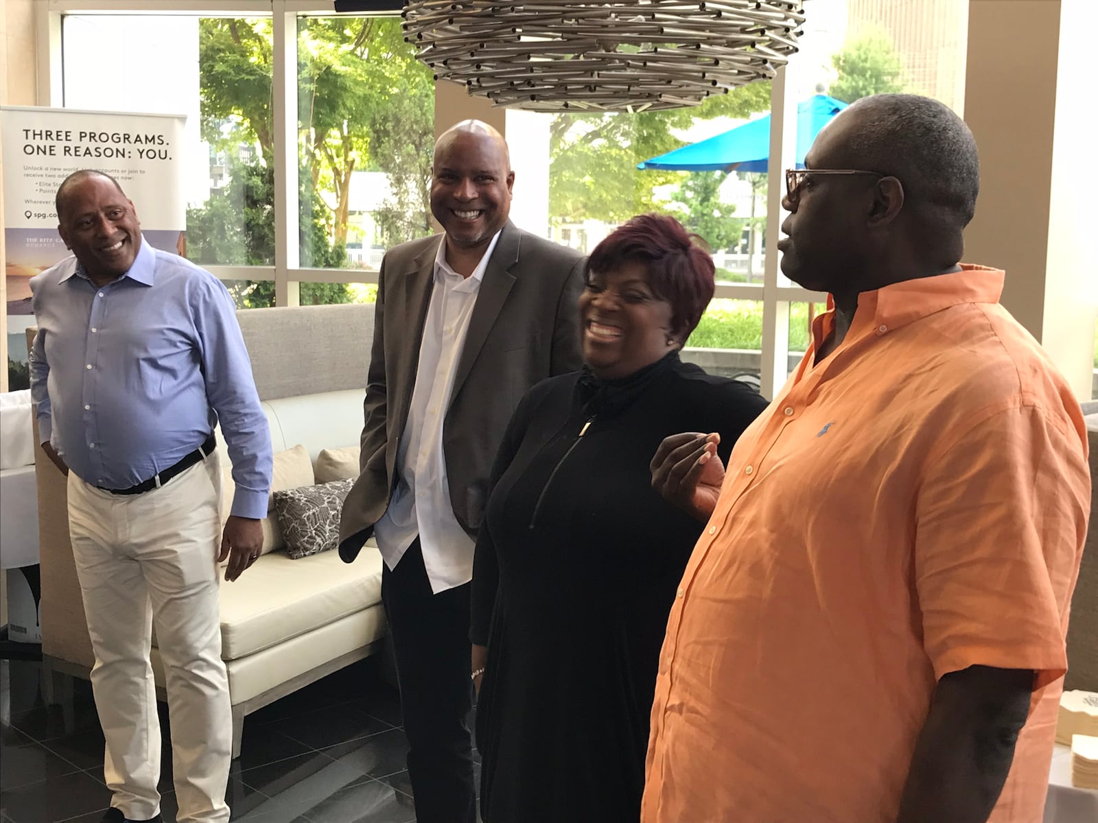 Frank Ski (left) with his boss Rick Caffey, his on-air partners Wanda Smith and Miss Sophia, at the Westin Buckhead for a party to celebrate his return to V-103 on July 2, 2018.