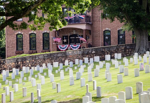 Marietta National Cemetery is without a flag at every headstone Saturday, May 23, 2020. Brad Quinlin, the cemetery’s volunteer historian, said freed slaves placed flower petals on headstones in the cemetery in 1868 to honor the Union soldiers who fought for their freedom, and flags have been placed at each grave site on the grounds since 1869, a Memorial Day or Decoration Day tradition that was put on hiatus this year. (Jenni Girtman for Atlanta Journal-Constitution)