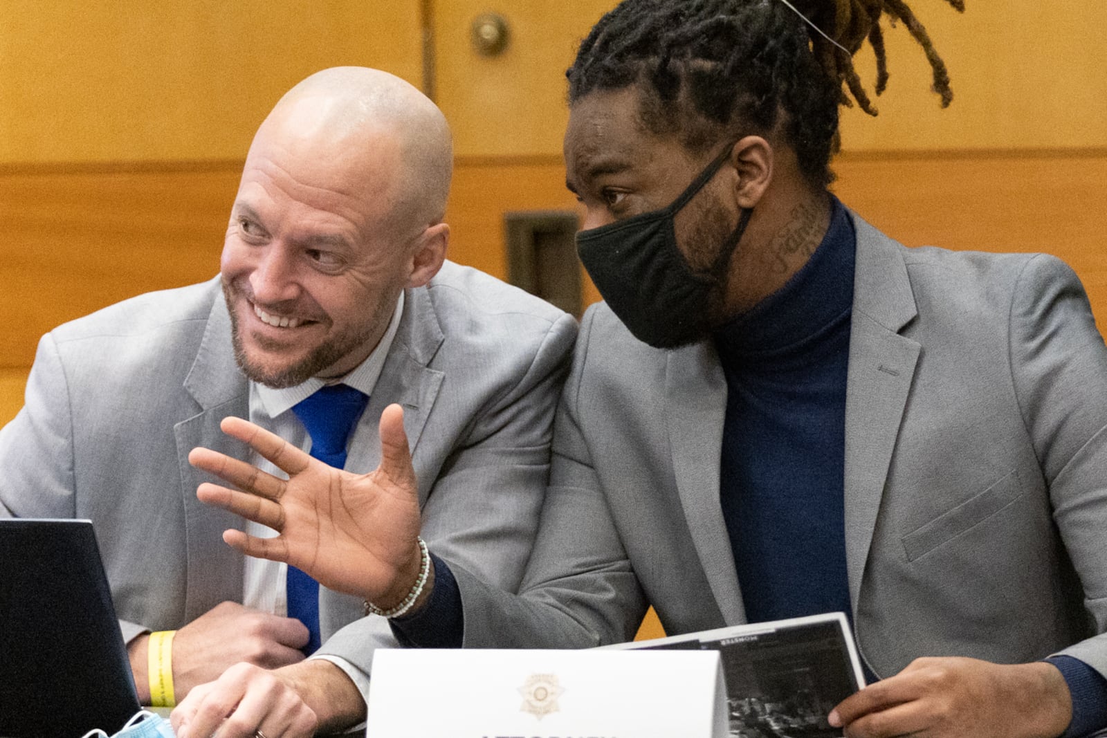  Attorney, Maxwell Schardt, left, talks with his client, Shannon Stillwell, as they wait for the Jury selection portion of the trial to continue in a Fulton County courtroom Tuesday, Jan. 24, 2023.  (Steve Schaefer/steve.schaefer@ajc.com)