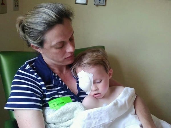 Mary Ellen with Jonas after he underwent surgery to remove his right eye. Contributed