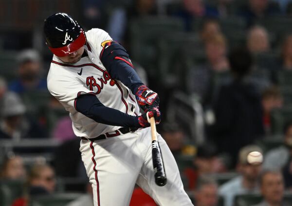 Atlanta Braves third base Austin Riley (27) hits a single during the sixth inning at Truist Park in Atlanta on April 23, 2024. Atlanta Braves won 5-0 over Miami Marlins. (Hyosub Shin / AJC)