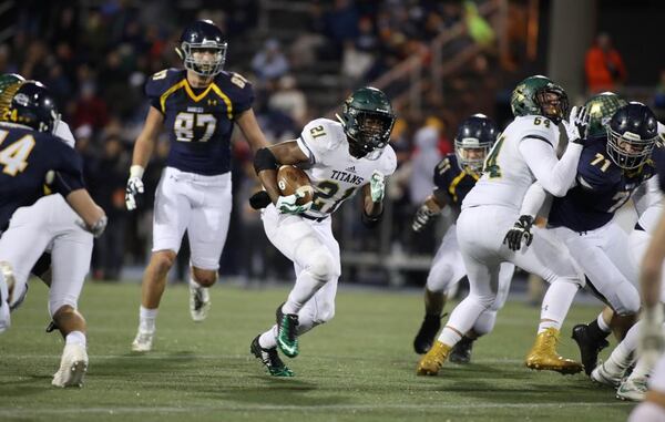  Jason Getz/photoBlessed Trinity running back Elijah Green (21) runs for yardage in the first half against Marist during the Class AAAA Championship game at Marist School Friday, December 15, 2017, in Atlanta. (Jason Getz / photo)