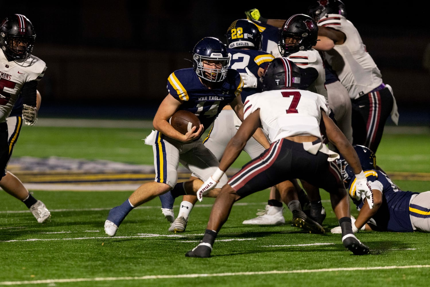 Marist quarterback Jack Quart (14) runs the ball during a NCAA High School football game between Marist and Warner Robins at Marist High School in Atlanta, GA., on Friday, November 15, 2024. (Photo/Jenn Finch, AJC)