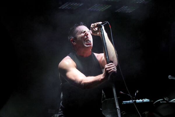 Oct. 24, 2013 - ATLANTA: Nine Inch Nails frontman Trent Reznor performing at Philips Arena. Akili-Casundria Ramsess/Special to the AJC) Trent Reznor of Nine Inch Nails (at Philips Arena in 2013). Photo: Akili-Casundria Ramsess/Special to the AJC.