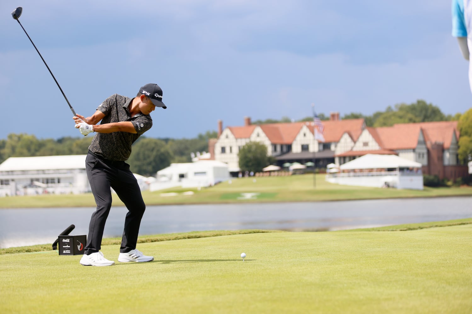 Collin Morikawa tees off on the eighth hole during the final round of the Tour Championship at East Lake Golf Club, Sunday, Sept. 1, 2024, in Atlanta.
(Miguel Martinez / AJC)