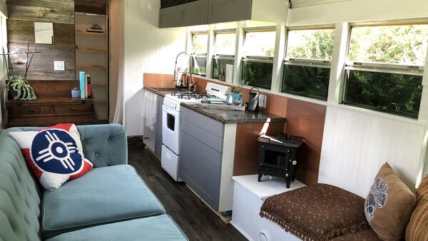 Jordan and Sam Page have furnished the interior of this repurposed school bus for under $20,000. (Matt Riedel/Wichita Eagle/TNS)