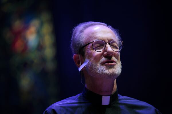 The Rev. David Peck, rector of St. James Episcopal Church, leads a "Contemplative Citizenship" service in Lancaster, Pa., on Tuesday, Oct. 15, 2024. (AP Photo/Jessie Wardarski)