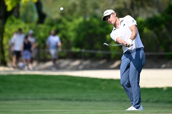 Collin Morikawa hits onto the ninth green during the final round of the Arnold Palmer Invitational at Bay Hill golf tournament, Sunday, March 9, 2025, in Orlando, Fla. (AP Photo/Phelan M. Ebenhack)