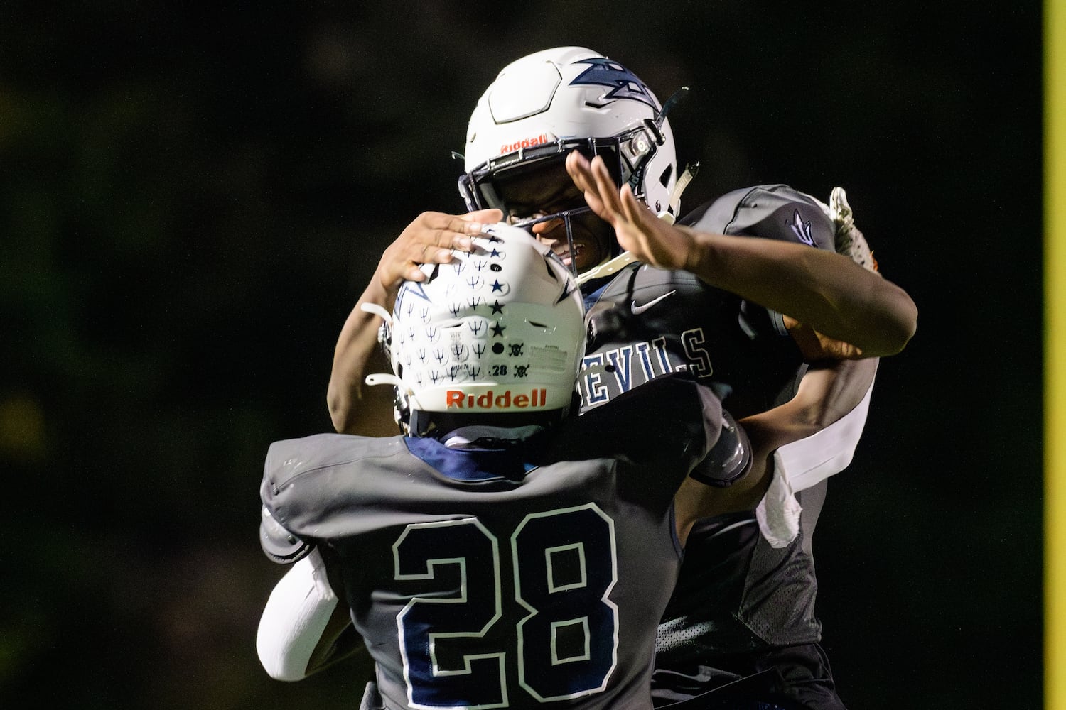 Norcross celebrates a touchdown against Peachtree Ridge Friday night. Norcross won 35-17. (Jamie Spaar for the Atlanta Journal Constitution)