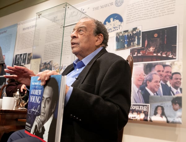 Andrew Young tells stories of the klan in Jacksonville during a press event for the release of the book and opening of the 90-day-exhibit "The Many Lives of Andrew Young" at the Millennium Gate in Atlantic Station on Friday, March 11, 2022 in conjunction with the Ambassador’s 90th birthday.  Young will cut the ribbon on the exhibit at tonight's gala at the gate.  The exhibit will be on display for 90 days.   (Jenni Girtman for The Atlanta Journal-Constitution)