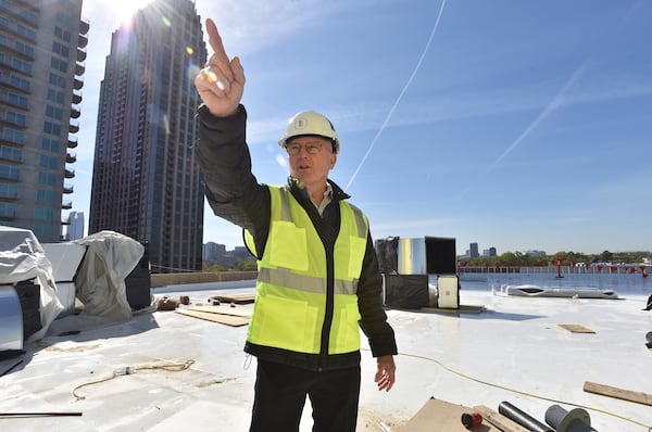 John Heagy, senior managing director for Hines Southeast Region, speaks on the rooftop of the T3 West Midtown construction site at Atlantic Station. T3 doesn’t yet have signed tenants, but Heagy expects announcements soon. Financial technology companies, law firms and creative companies are on the target list.