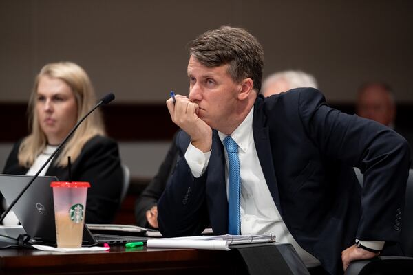 Board of Elections attorney Daniel White listens to arguments in Cobb Superior Court Thursday regarding the candidate disqualification lawsuit that may determine the legality of Cobb County's district map on Thursday, June 20, 2024. White urged the judge to postpone the district commission elections to 2025 if she rules the map unconstitutional. (Ben Hendren for the Atlanta Journal-Constitution)